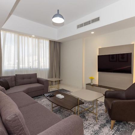 Platinum Coast Hotel Apartments Fujairah Buitenkant foto Living room