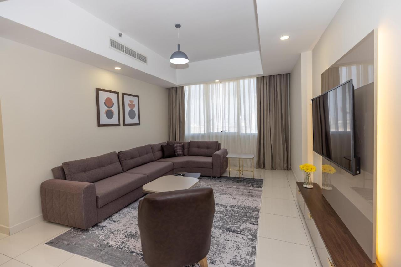 Platinum Coast Hotel Apartments Fujairah Buitenkant foto Living room