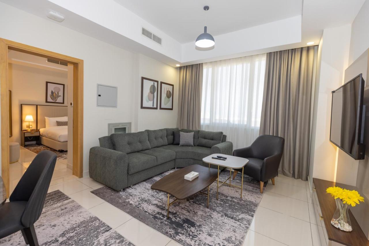Platinum Coast Hotel Apartments Fujairah Buitenkant foto Living room