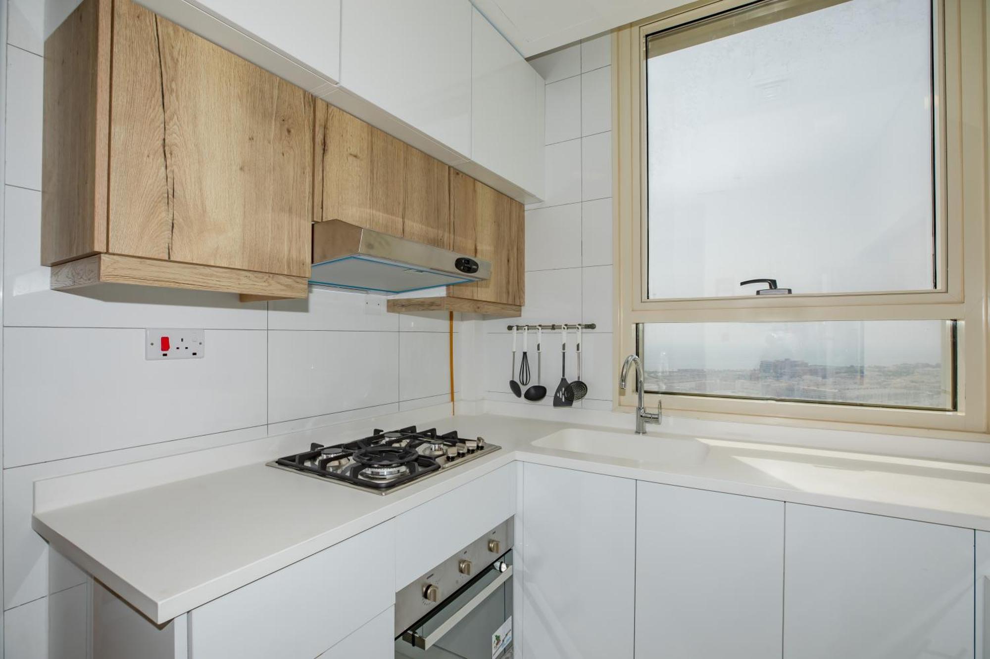 Platinum Coast Hotel Apartments Fujairah Kamer foto A modern kitchen