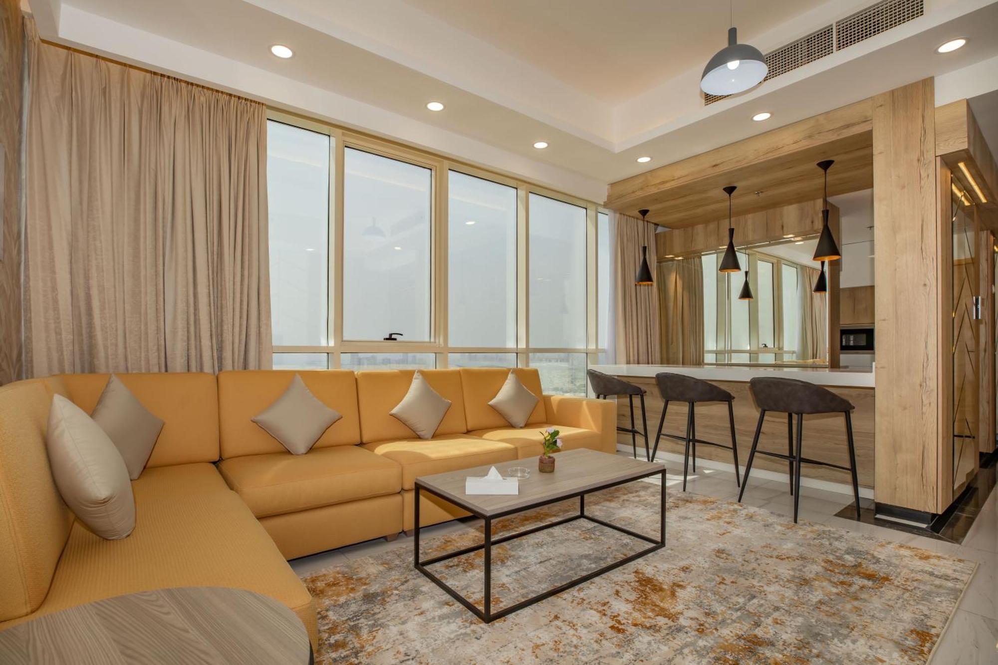 Platinum Coast Hotel Apartments Fujairah Kamer foto A living room in a suite at the hotel